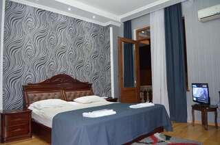 Отель Bonus Hotel Тбилиси Роскошный четырехместный номер-2